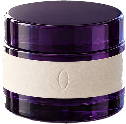 The Day Cream, a violet glass bottle with a paper band