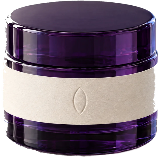 The Day Cream, a violet glass bottle with a paper band