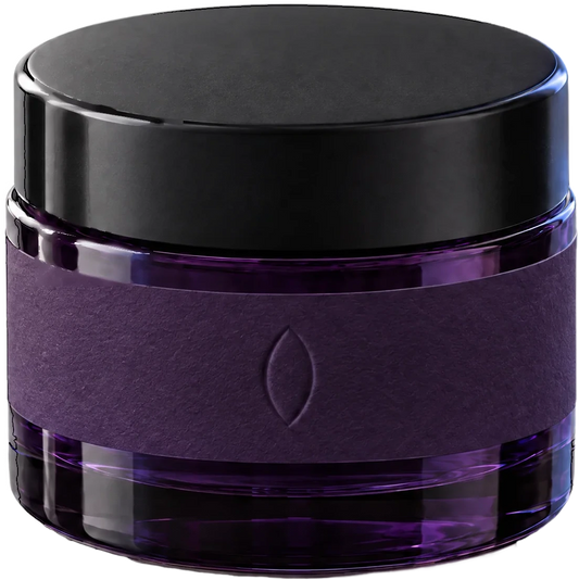 The Night Cream, a violet glass bottle with a paper band