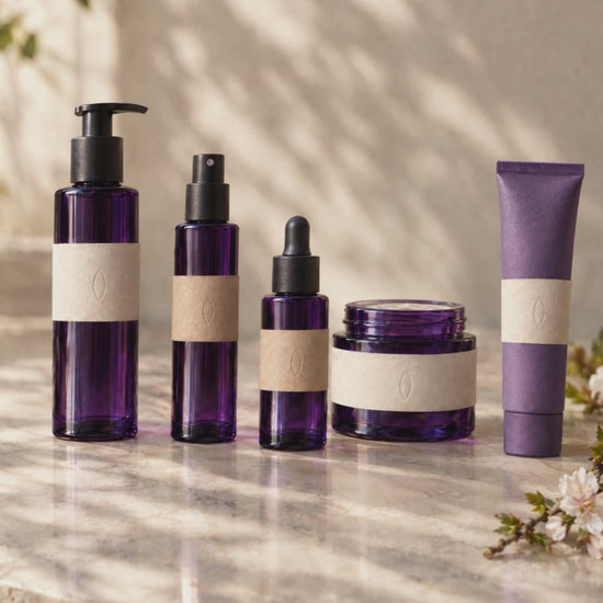 The five morning bottles on the marble, the light moving across them