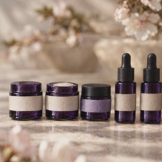The six ten millilitre bottles, each passing through focus in turn