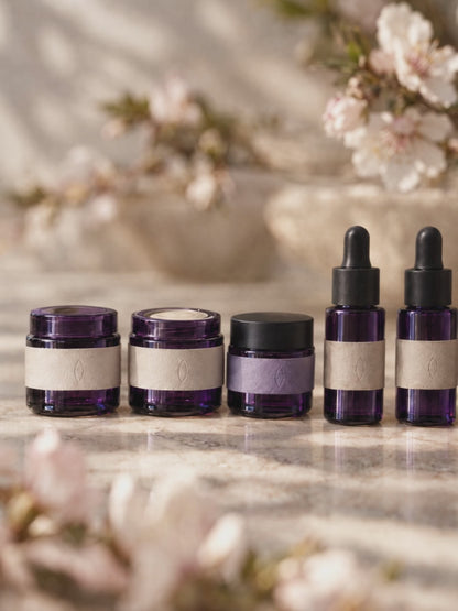 The six ten millilitre bottles, each passing through focus in turn